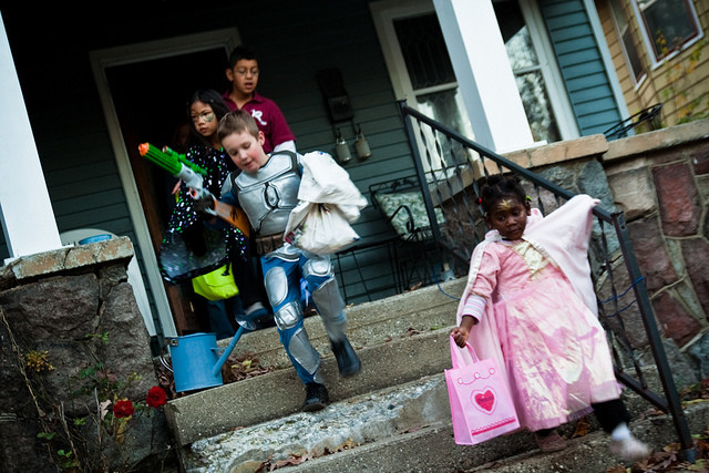 A group of children trick-or-treating.