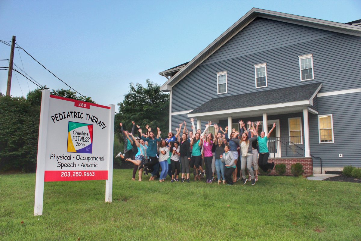 cheshire fitness zone staff cheering outside of their facility