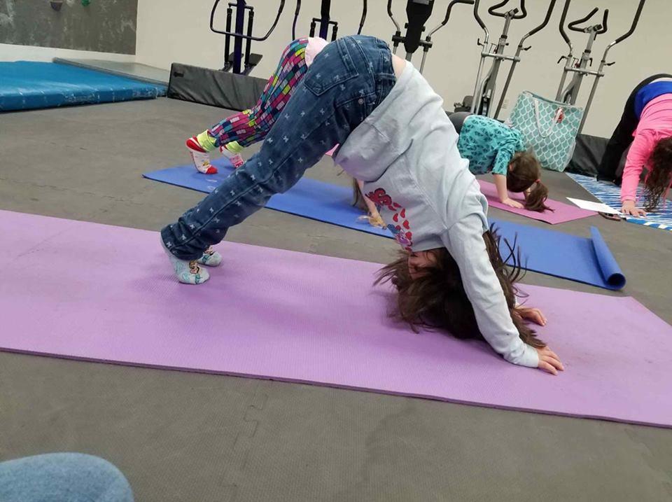 child doing yoga