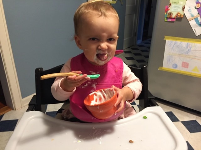 Toddler feeding herself