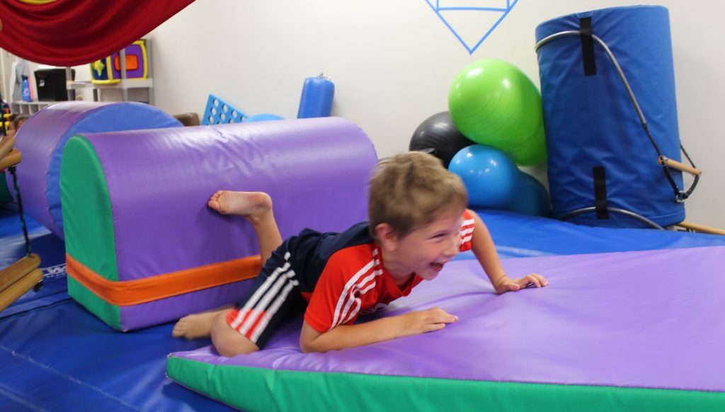 Child animal moving to benefit his core strength and mobility, while having fun!