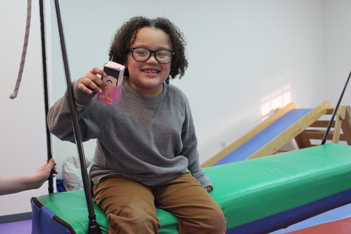 child wearing glasses to increase his vision