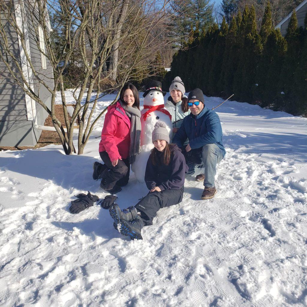 playing outside in snow, working on speech development