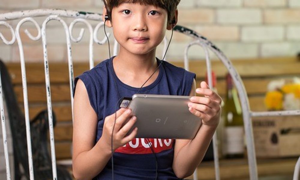 kid with headset