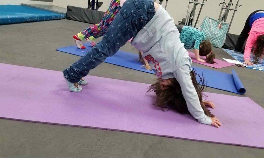 child doing yoga